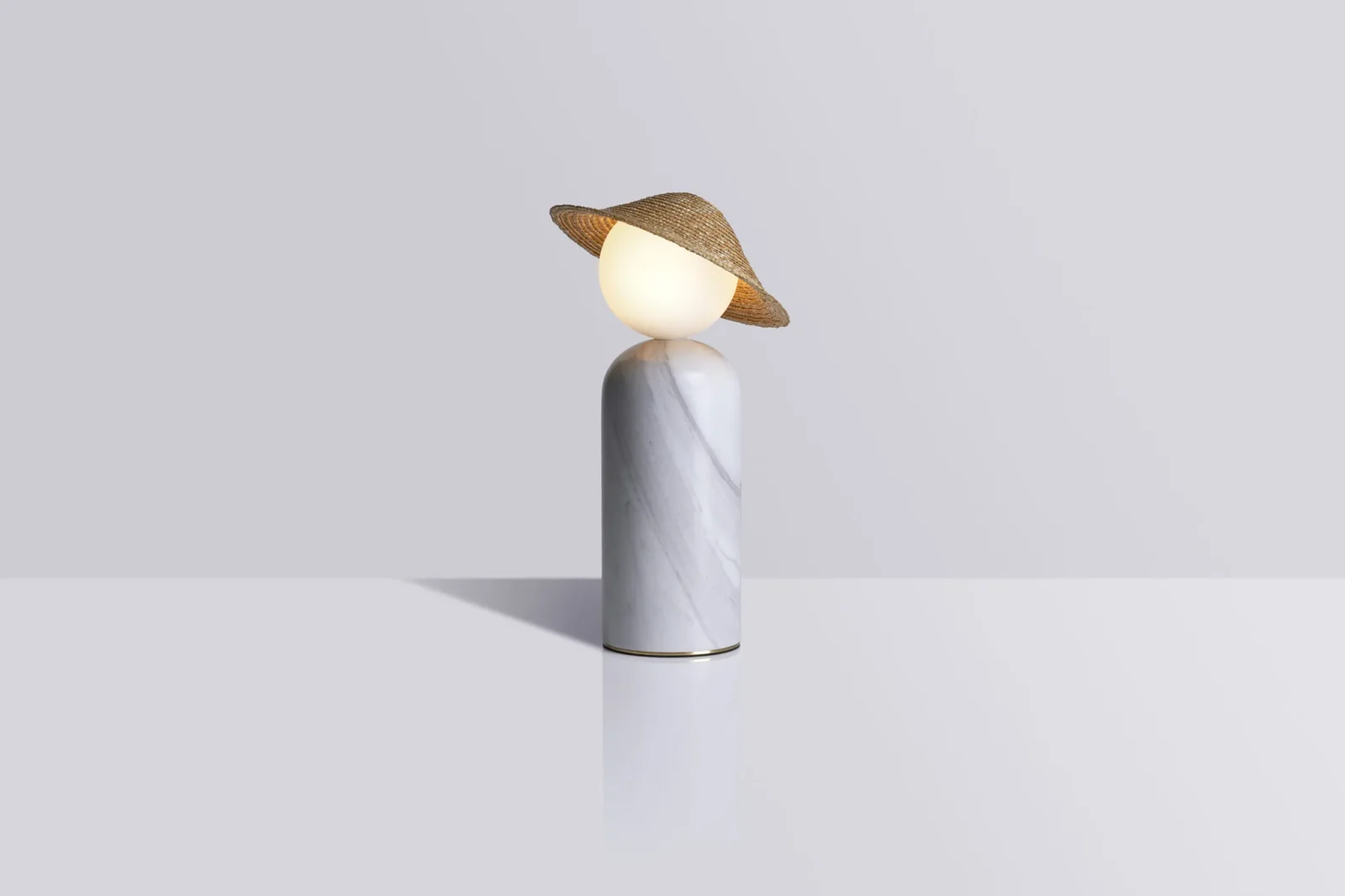 Théros 0.1 marble table lamp in white Volakas marble with a straw hat by Studio Aristotelis Barakos