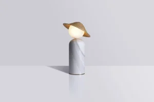 Théros 0.1 marble table lamp in white Volakas marble with a straw hat by Studio Aristotelis Barakos