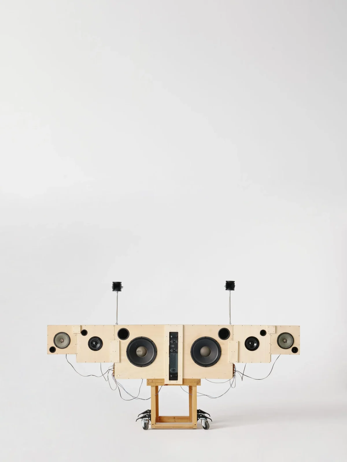 Sound System 01 speaker tower in reclaimed poplar plywood by Lucas Munoz Munoz, functional art for a maximalist interior
