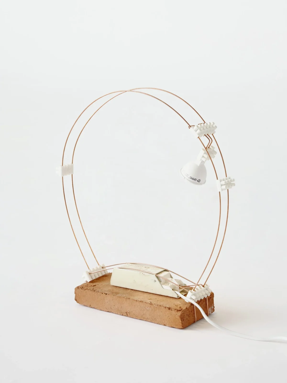 B.A.R.E Series 'Small Circular' Table Lamp in Brick and Copper On white background front view