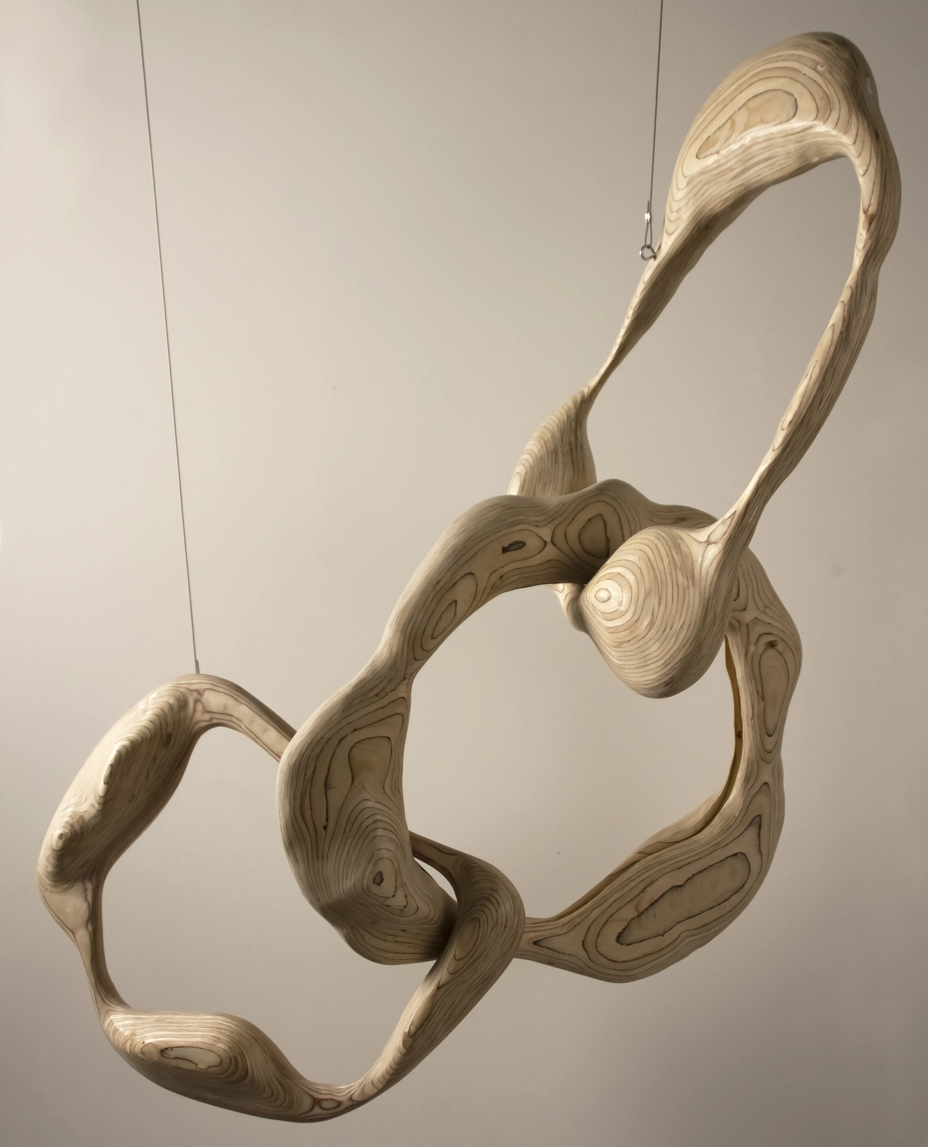 Handcrafted wood decor piece Flying Wheels by Dace Sūna