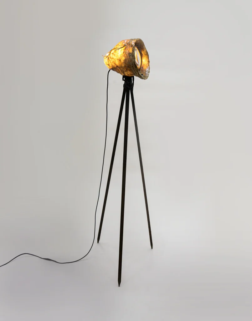 Microbiome I Floor Lamp in Bio Plastic holding glass capsules, front view.