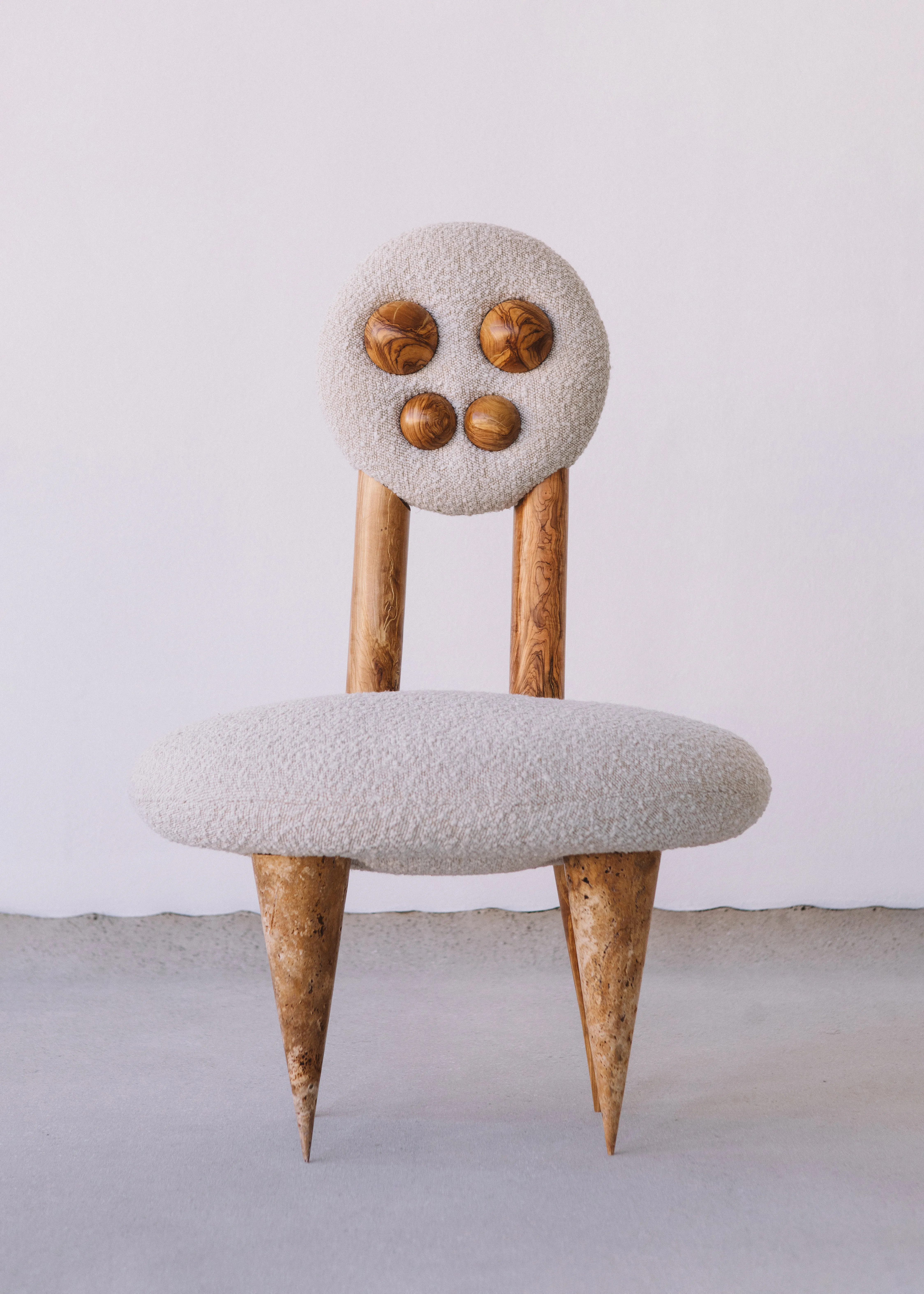 Ooo Chair – Upholstered Wood and Marble Chairs
by furniture designers Worn Studio