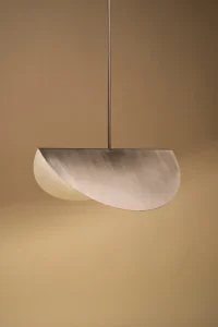 Two Circles pendant lamp, two overlapping brushed stainless steel discs hanging from a slim rod by Georgiev Kiril