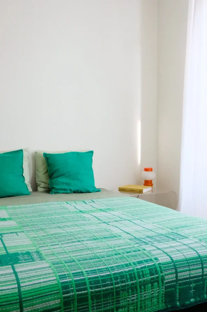 Beyond Bold Emerald jacquard woven blanket by Emma Terweduwe
