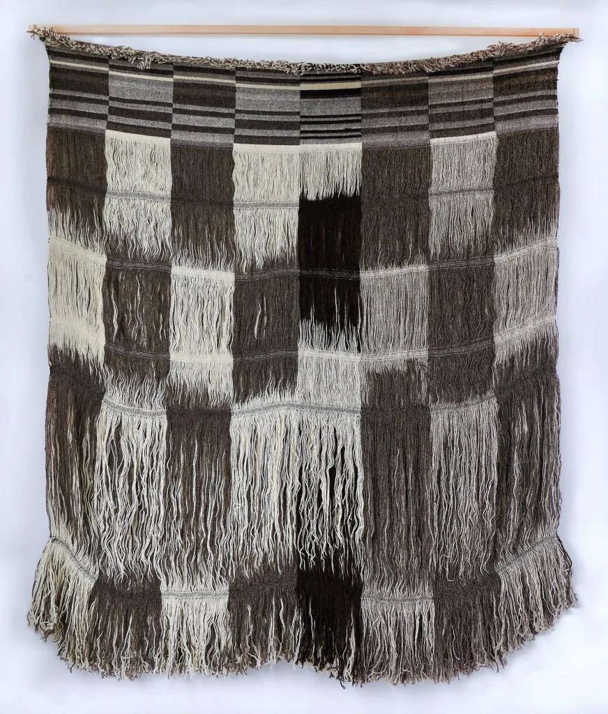 Handwoven textile throw by Maria Sigma