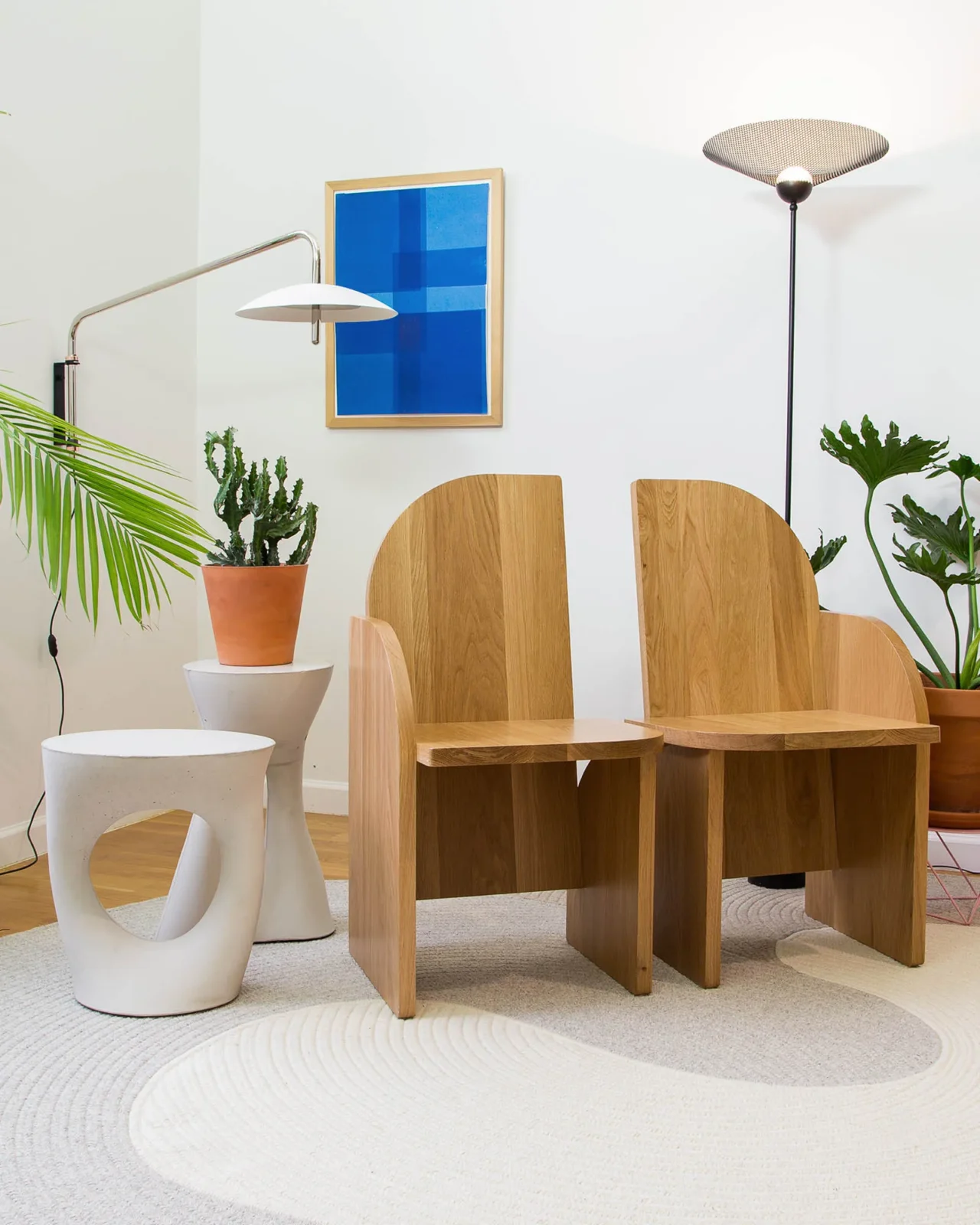 Pair of Bluff side chairs in white oak with straight tapered legs