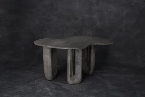 Amazonas low table hand-carved in gray marble by Studio Ayres