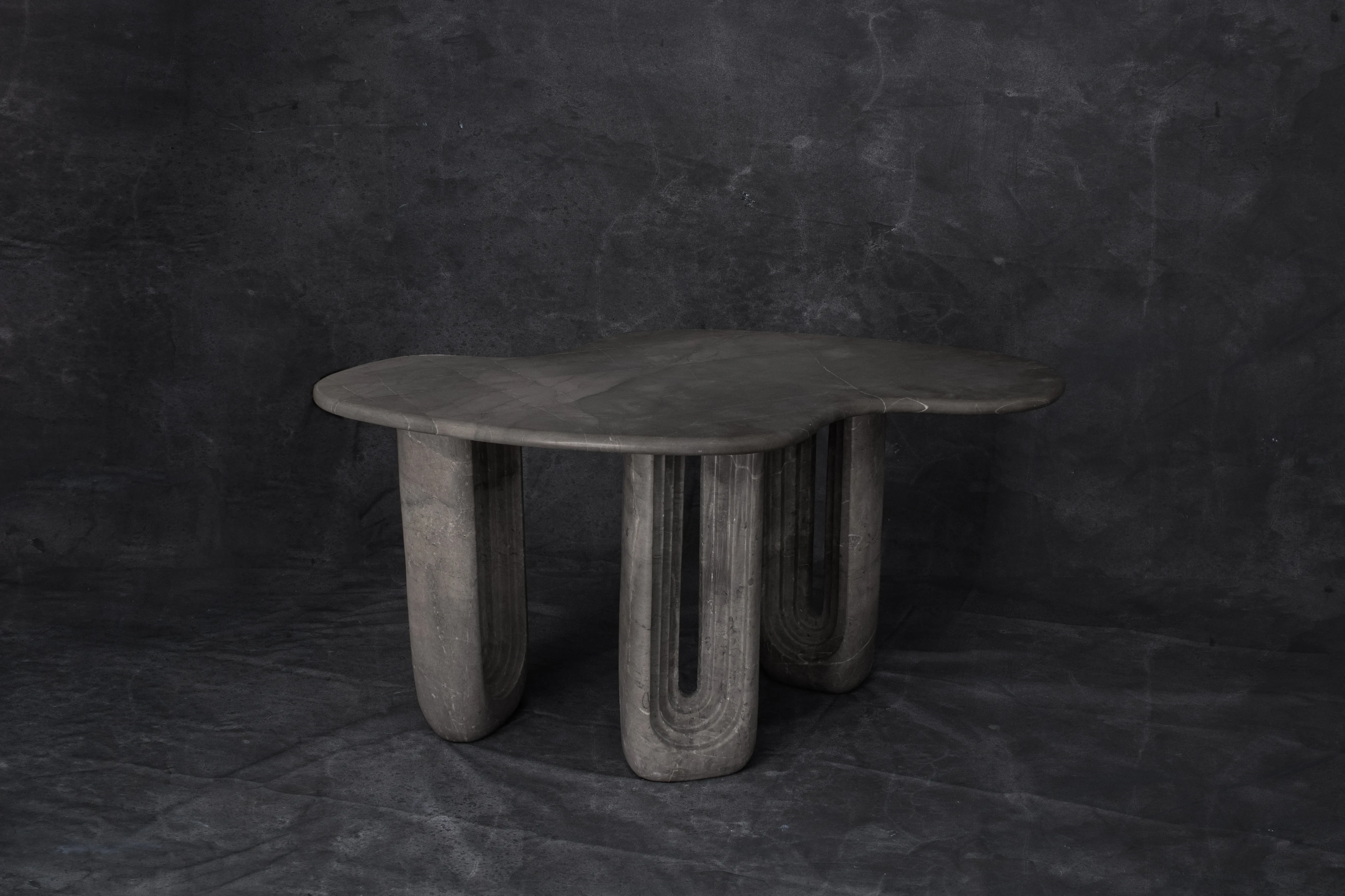 Amazonas low table hand-carved in gray marble by Studio Ayres