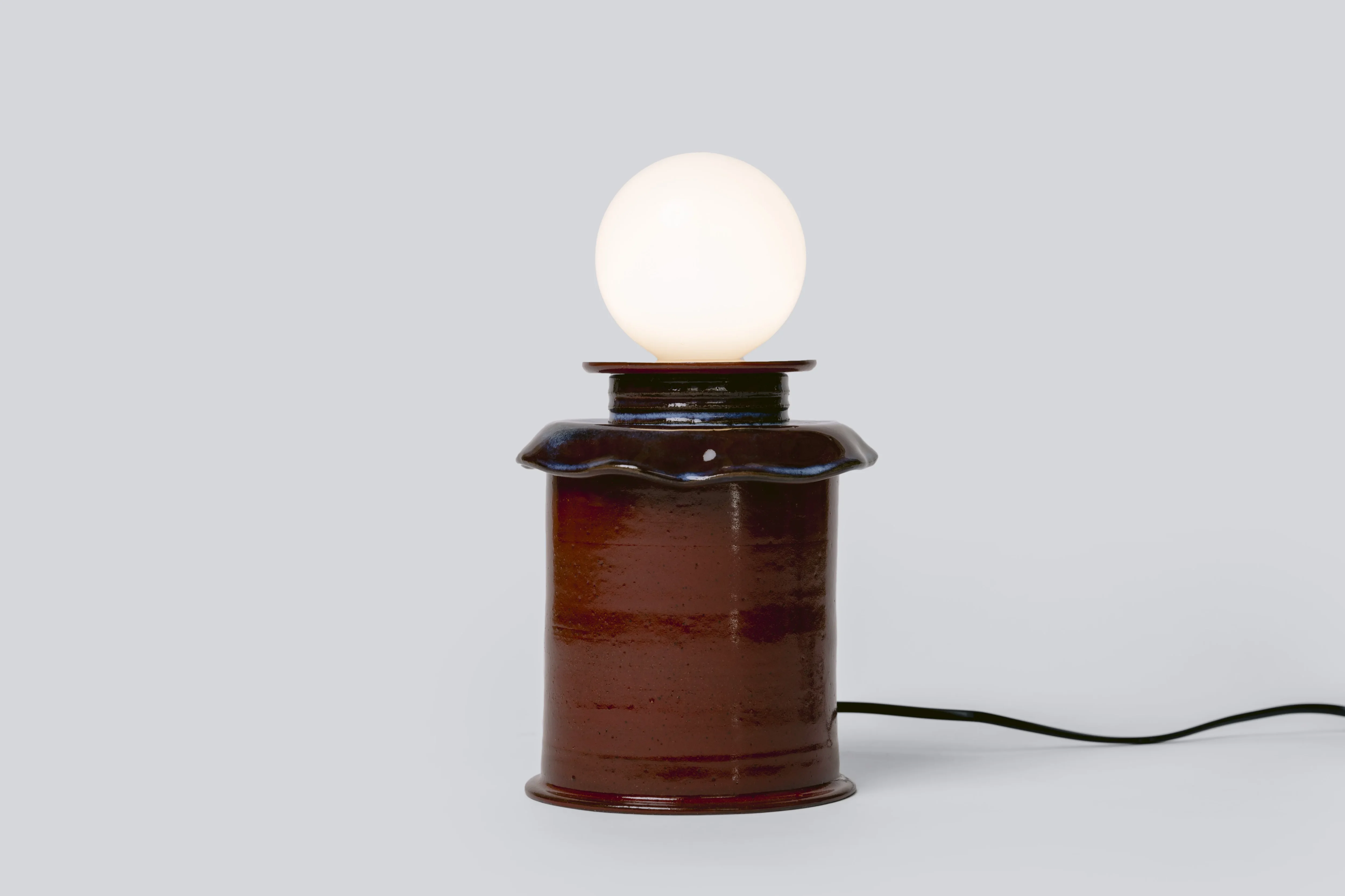 Baby Tutu wheel-thrown red glazed stoneware table lamp by Slo