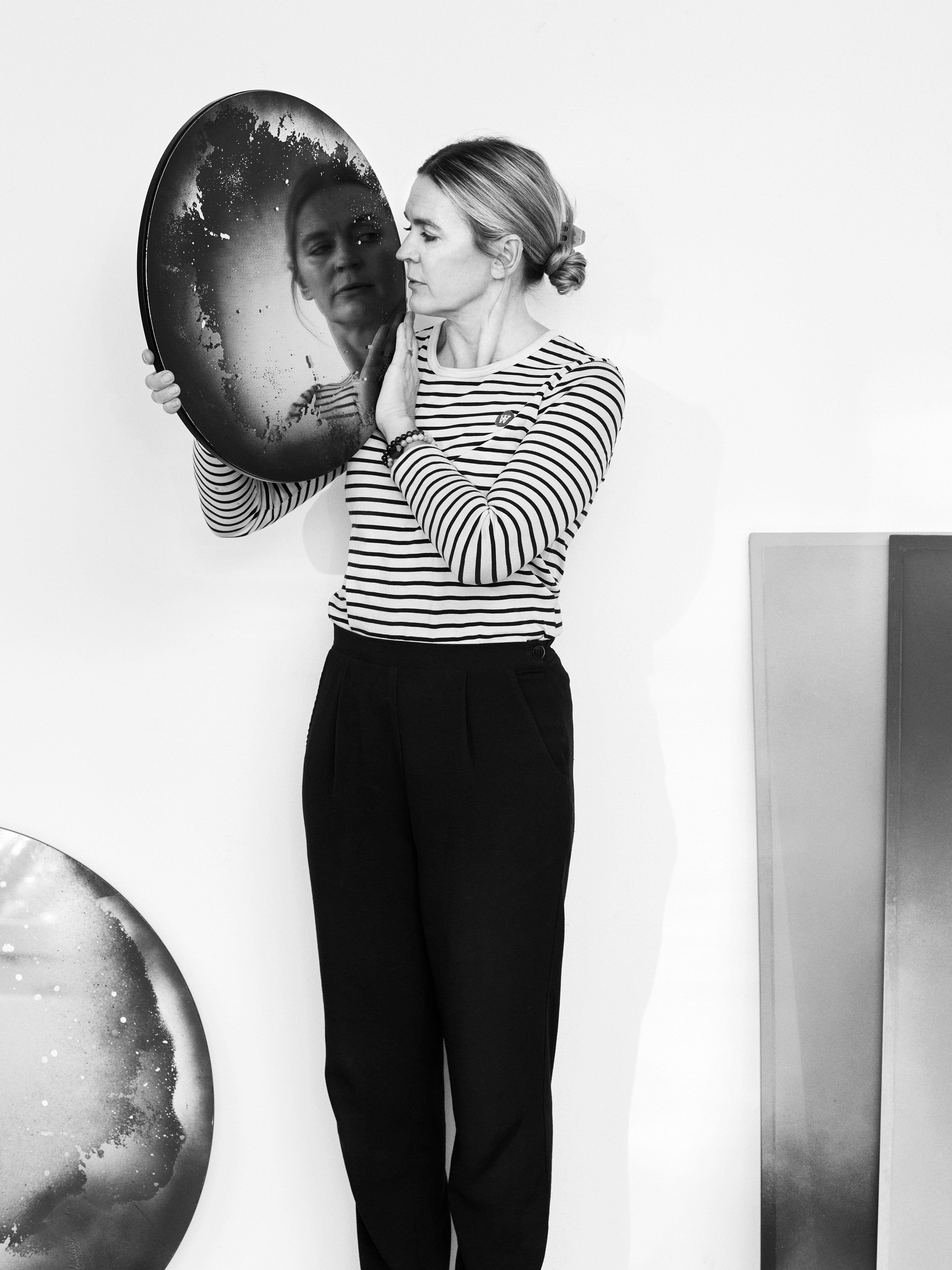 Danish artist Anne Nowak with one of her wall works