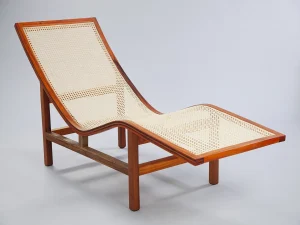 Chaise Sossego steam-bent solid wood and natural cane lounge chair by am.o atelier