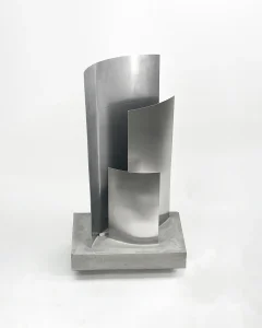 Essenz concrete and brushed stainless steel sculptural floor lamp by case studios