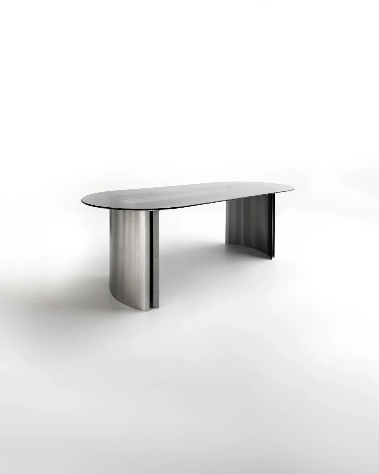 Smoked Glas Table With Rounded Stainless Steel Frame by case
