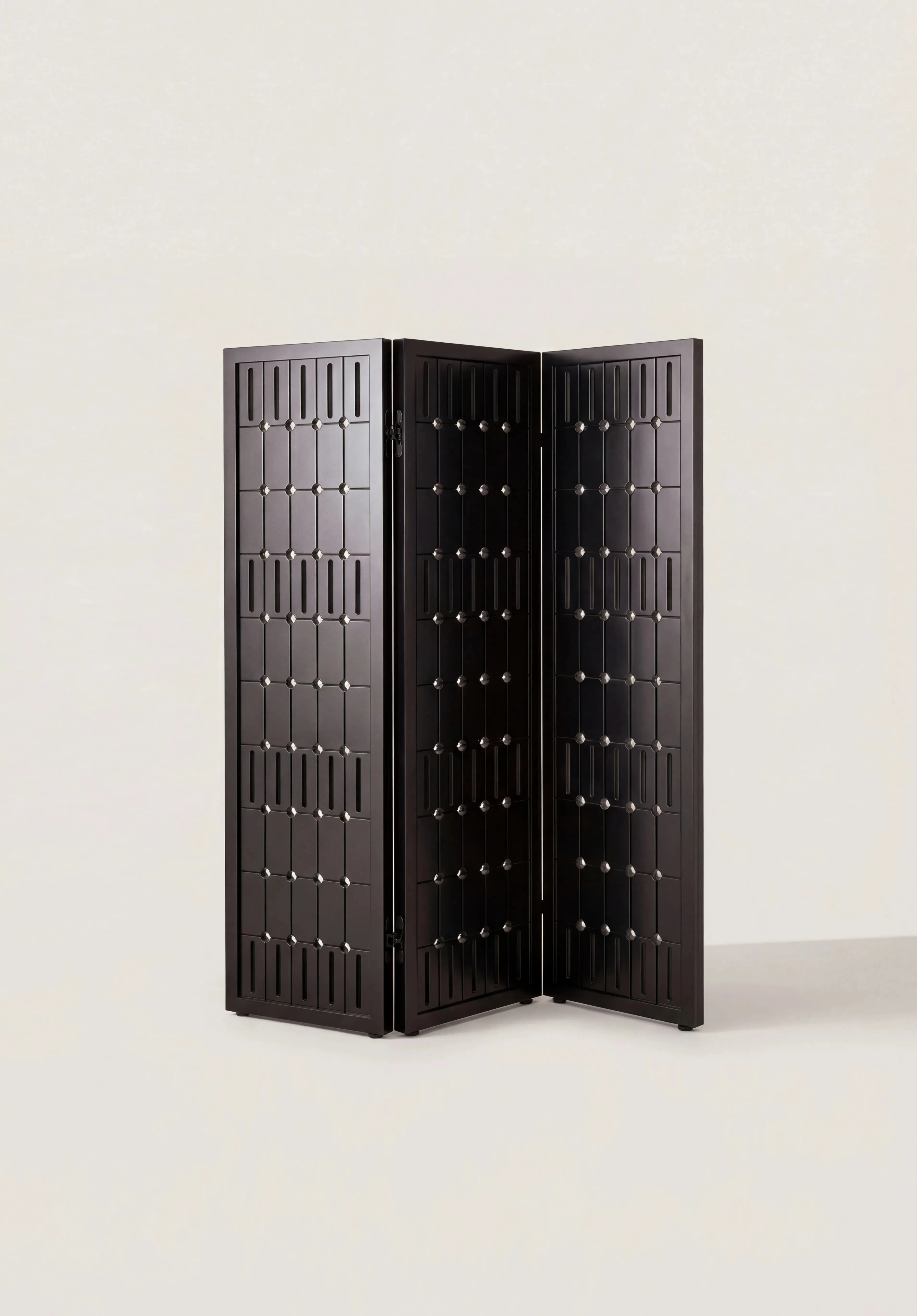 Folding screen paravent with circular perforations by Zoé Wolker Studio