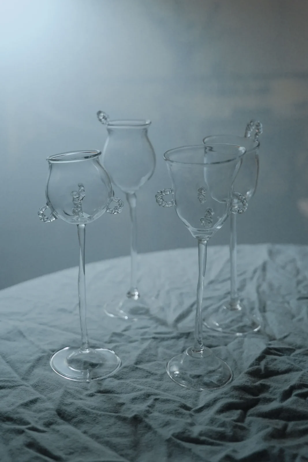 Reliquia glassware set of hand-blown tumblers and carafe in pale tinted glass