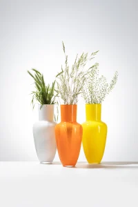 Garden vases in hand-shaped yellow, white and orange blown glass