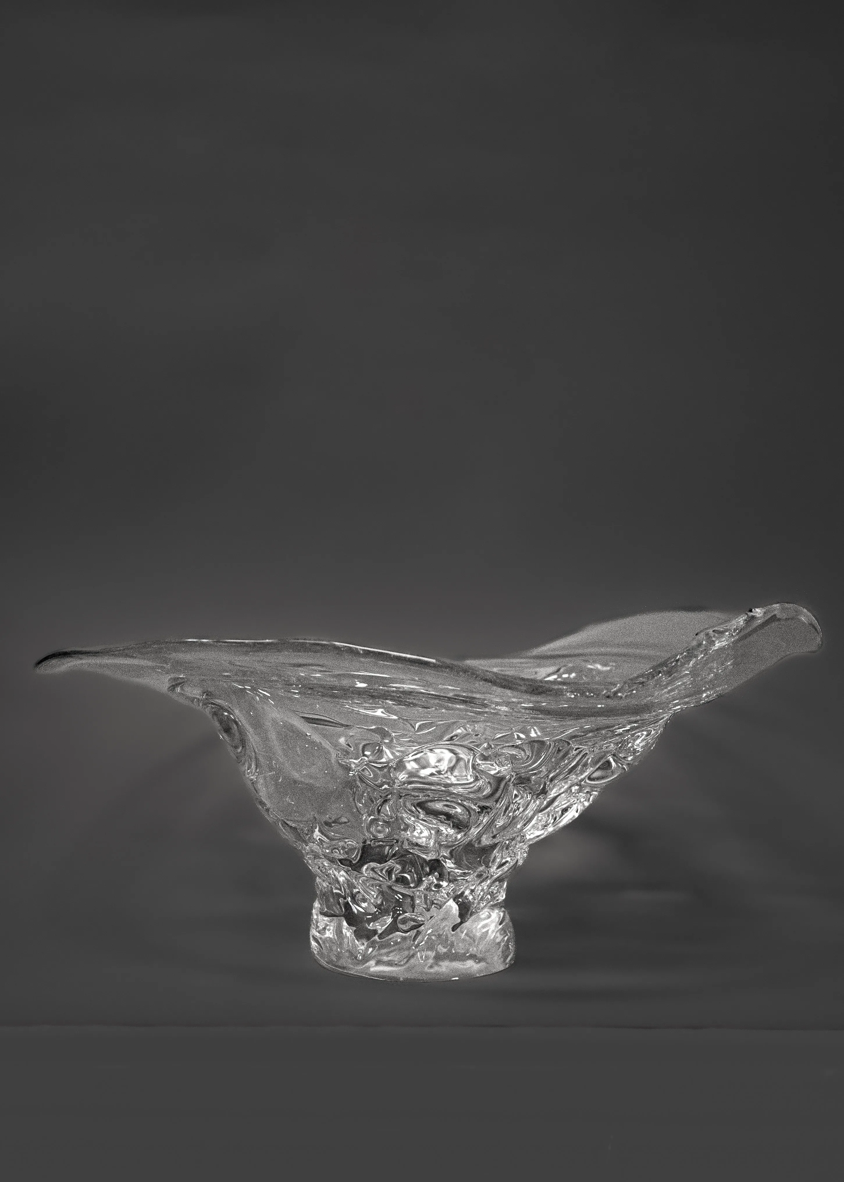 Organic hand-blown glass platter with undulating rim