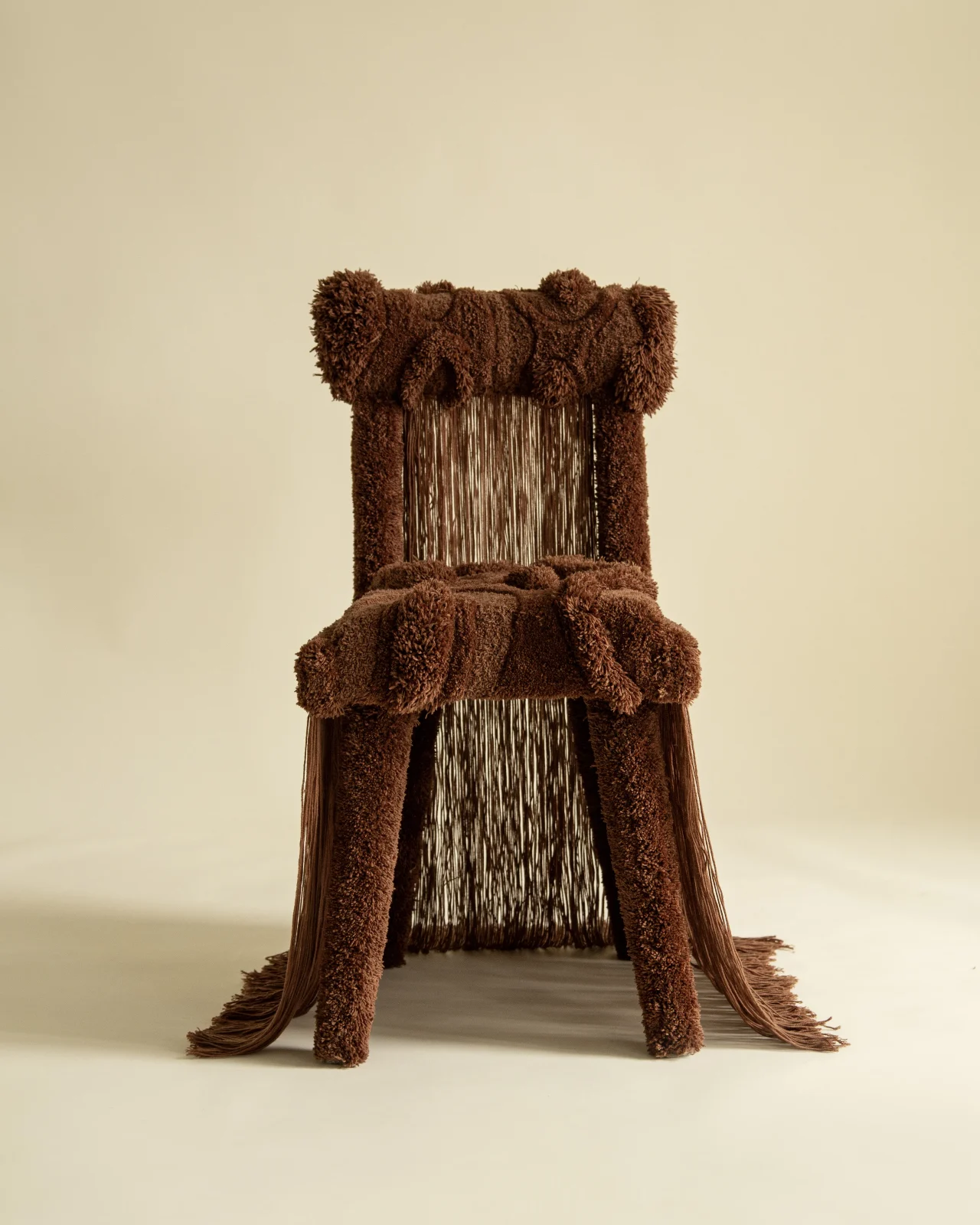Hand-tufted wool over a sculptural frame