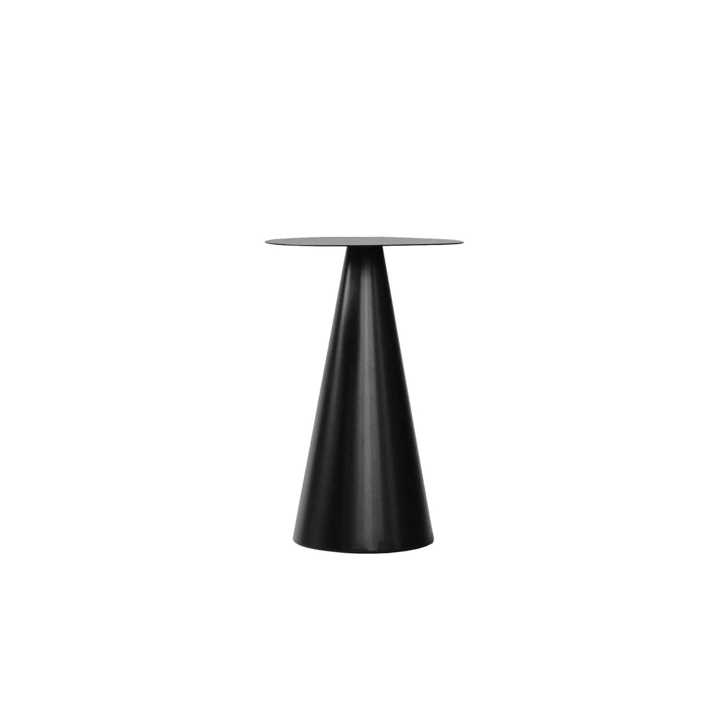 Cherry side table with a round black top on a tall black steel cone base by SALAK Studio