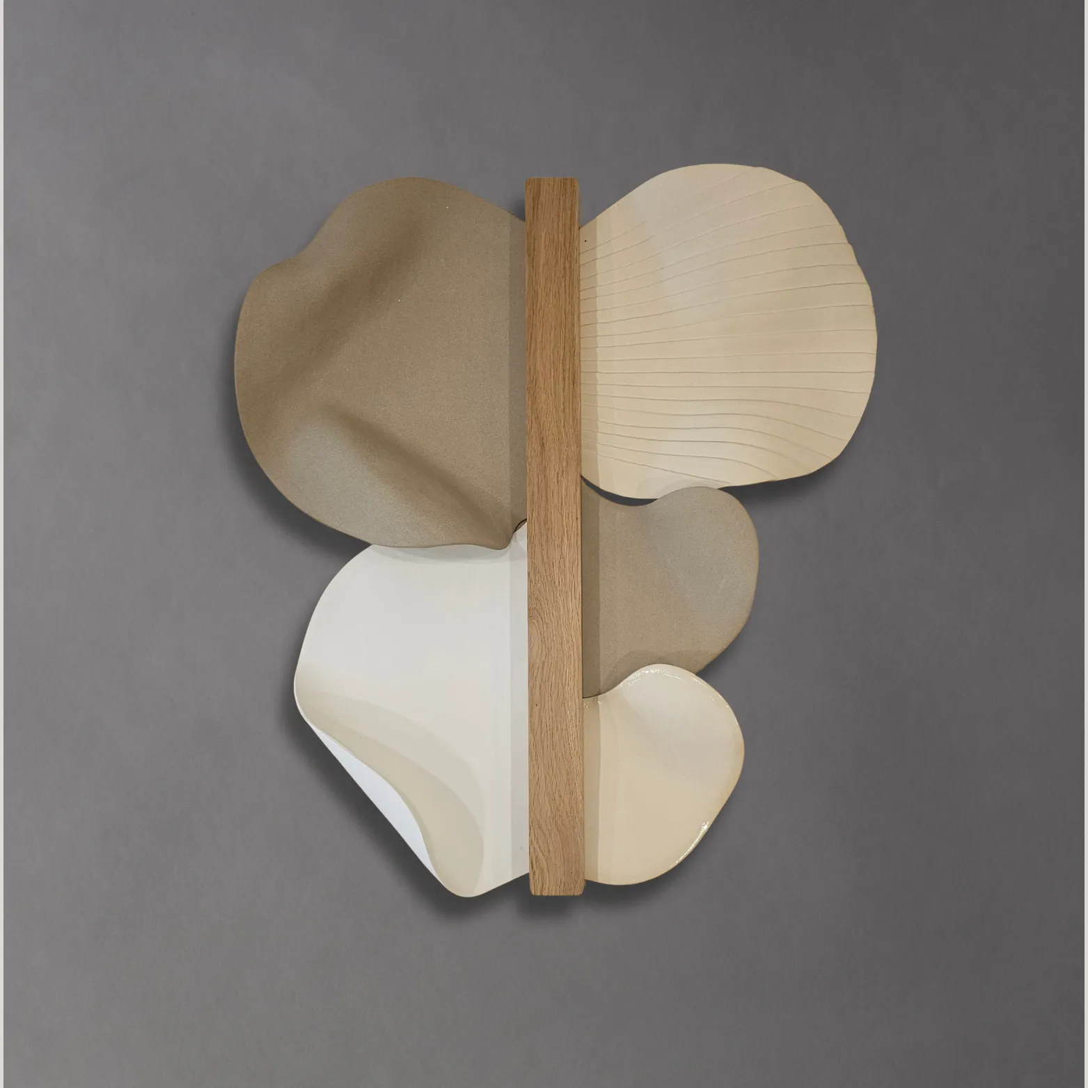 Abundance wall sculpture in oak and stoneware waves