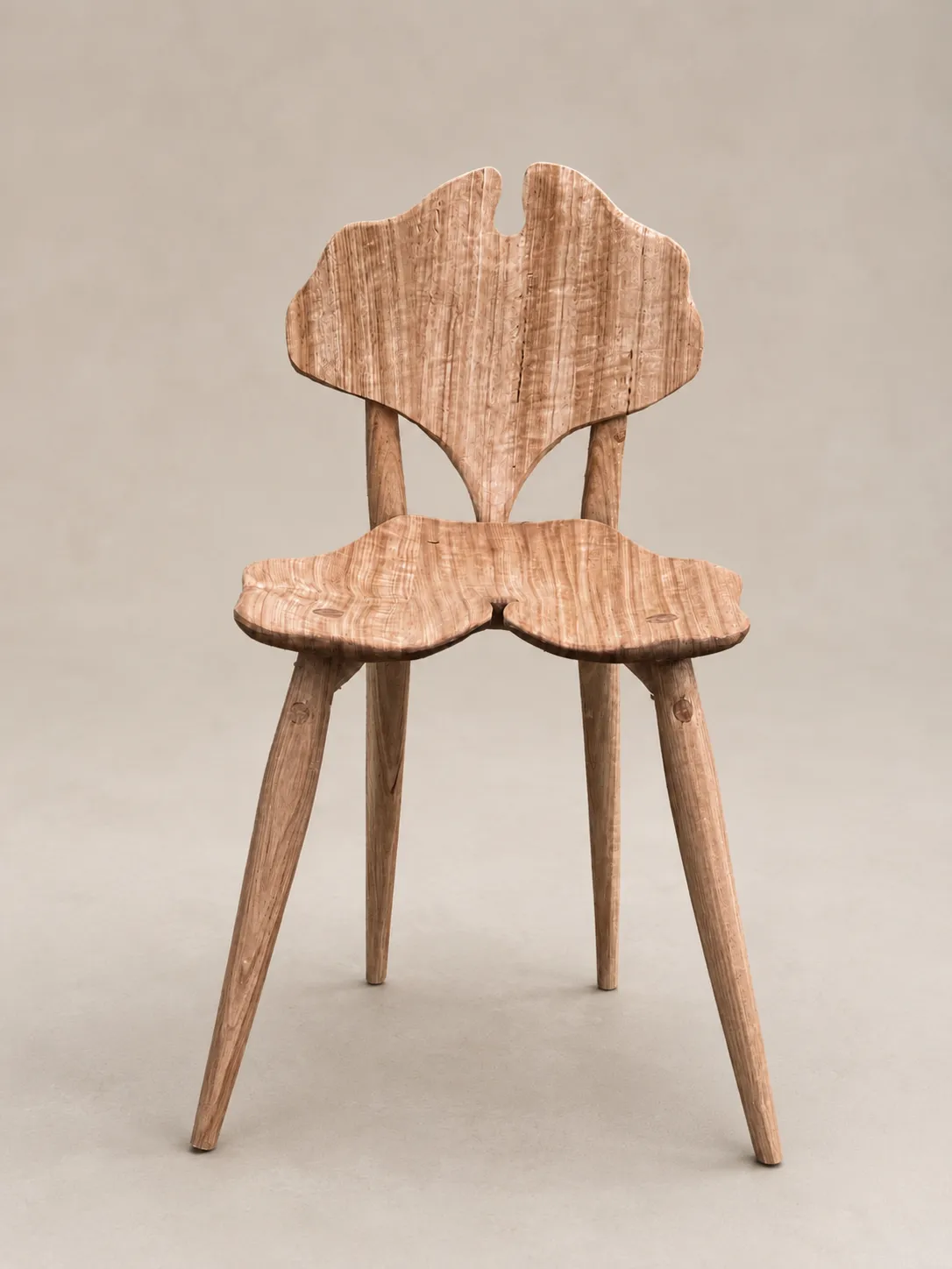 Ginkgo Chair Natural by Luke Crouch, hand-carved Australian hardwood with leaf-shaped backrest and tapered legs