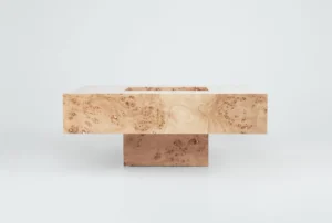 Round poplar burl wood coffee table with a semi-matte finish by Petra Madalena