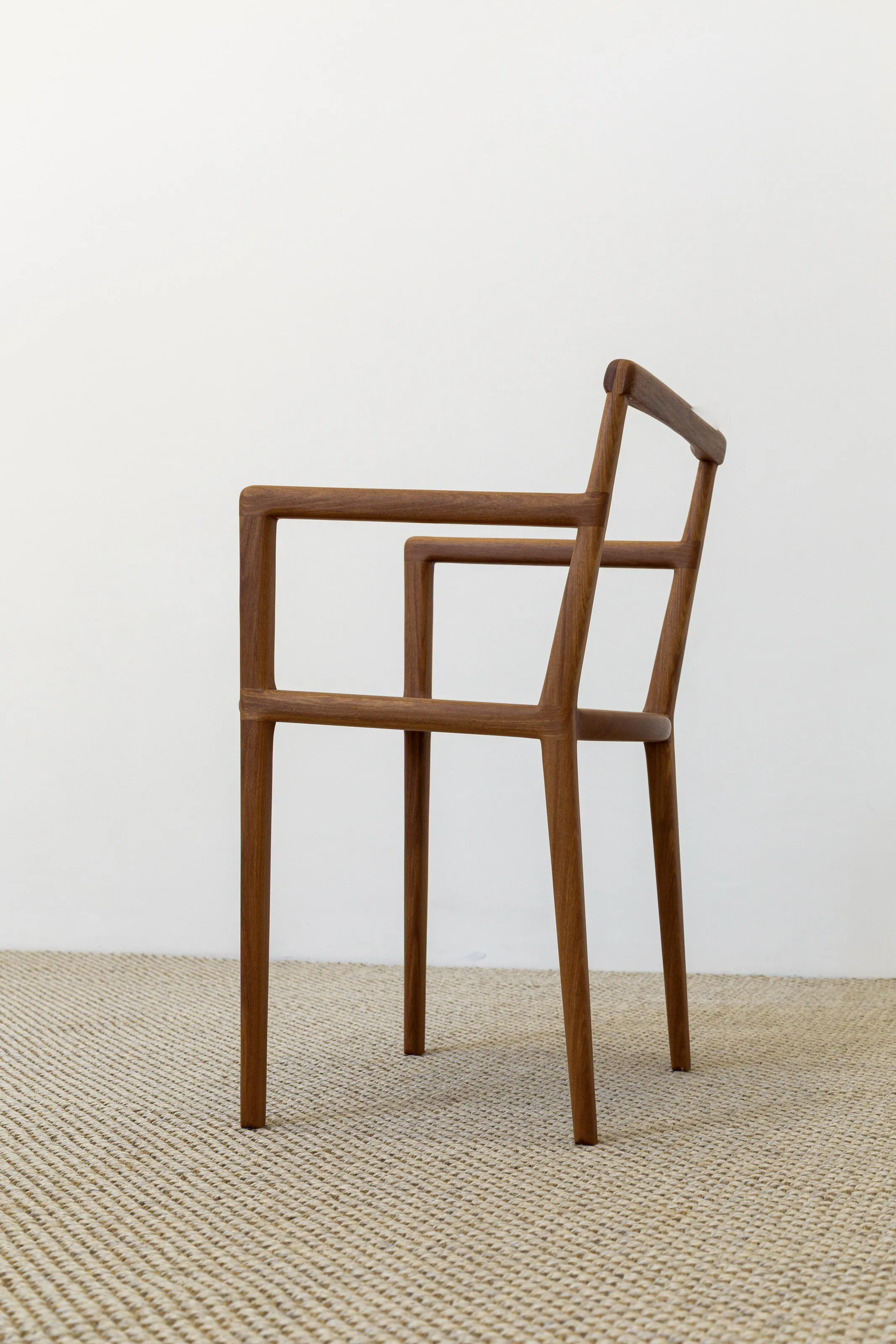 Gi Armchair in solid wood with slender rounded frame and traditional joinery