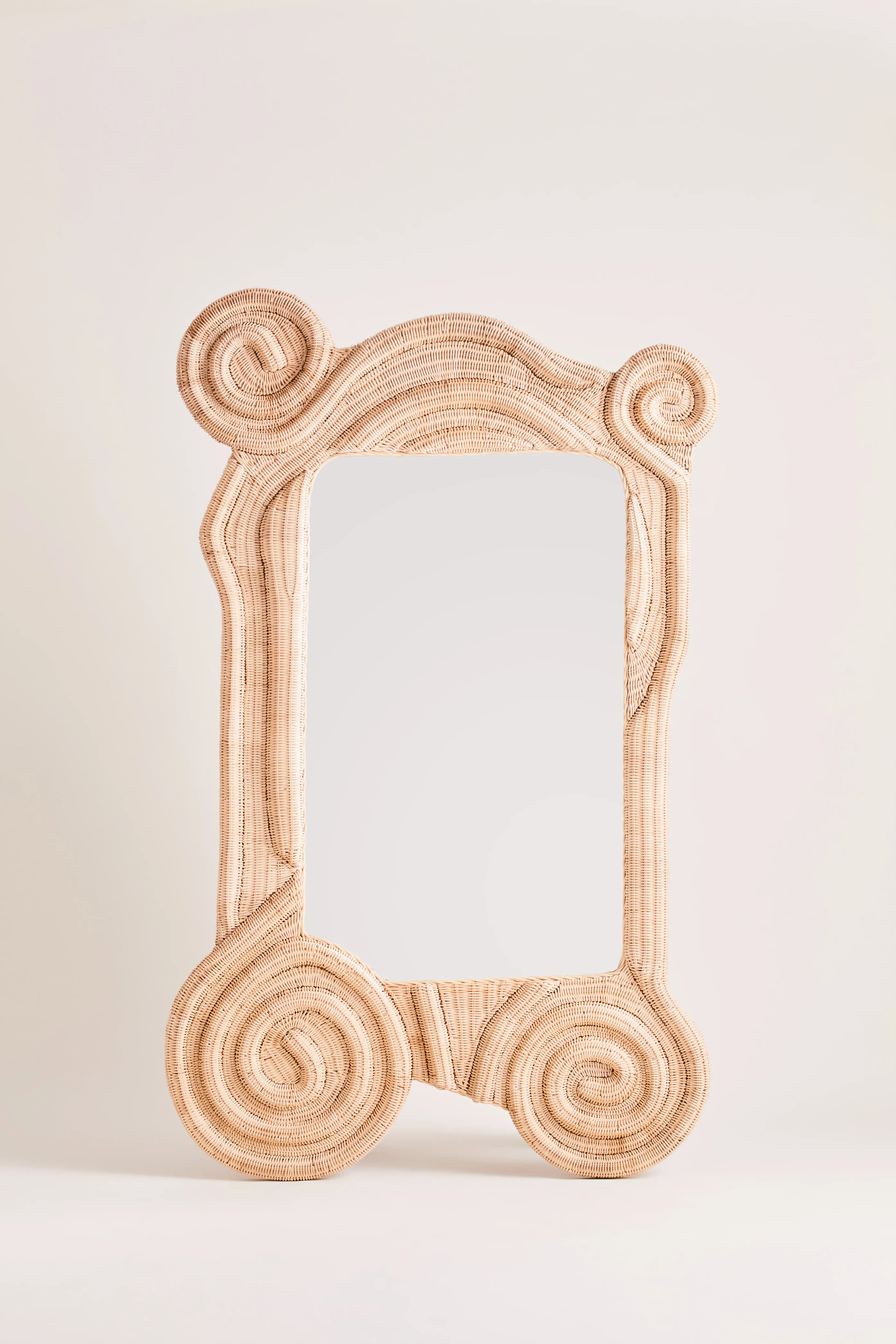 Hannah Mirror by Heaps and Woods, sculptural natural rattan wall mirror