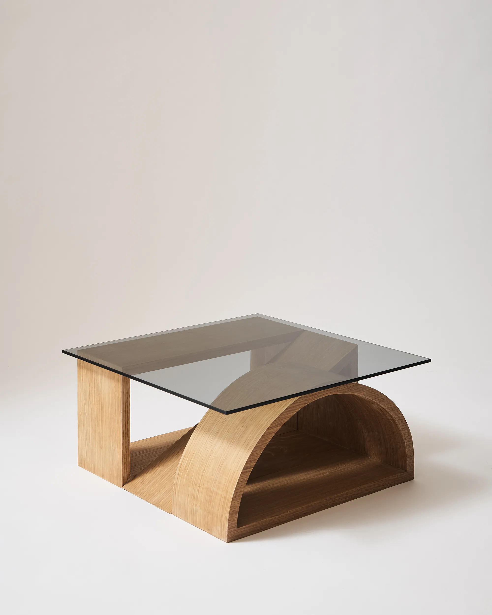 Formation side table in oak veneer with square, triangle and circle forms under a smoked glass top by Theodóra Alfreðsdóttir