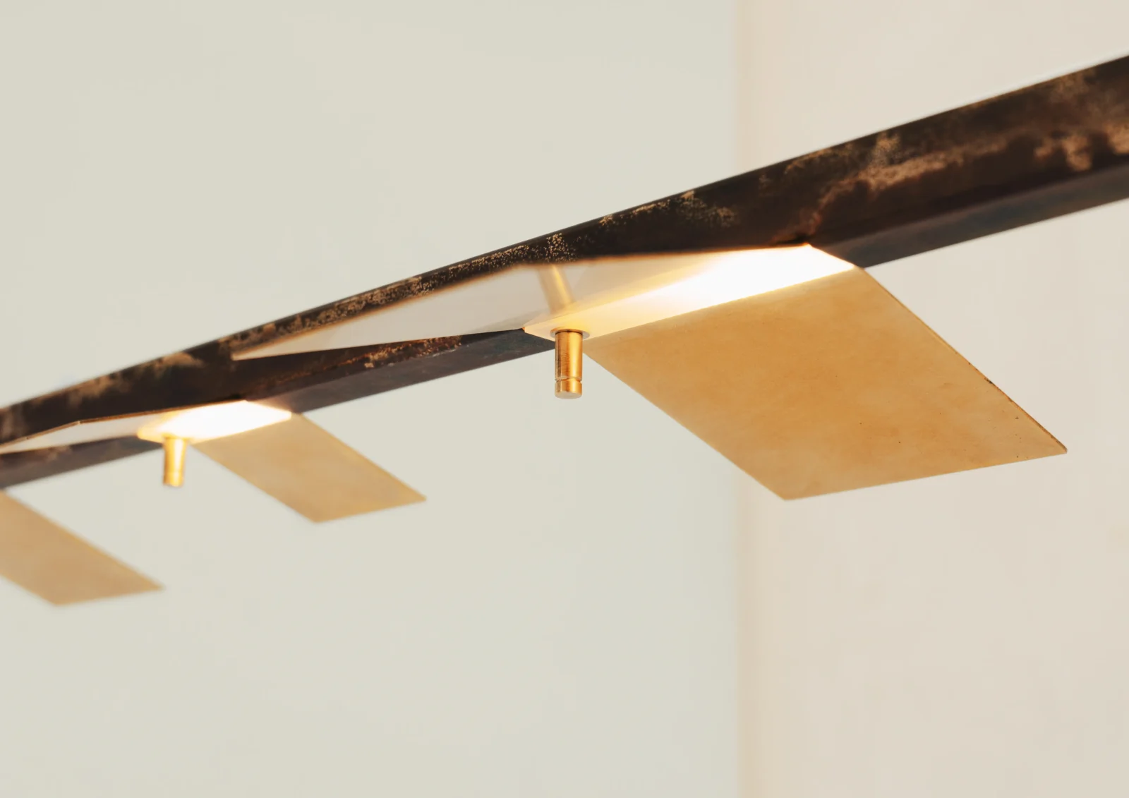 Citiez 0.3 Pendant Lamp in Brass and Steel on a white bckground from the bottom
