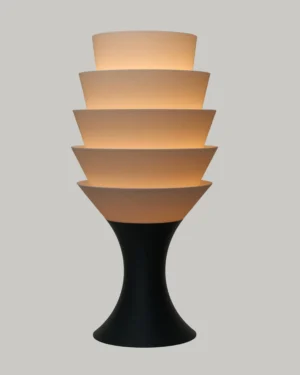 Empilé Grande Table Lamp in Jade White PLA with a black base, on a table.
