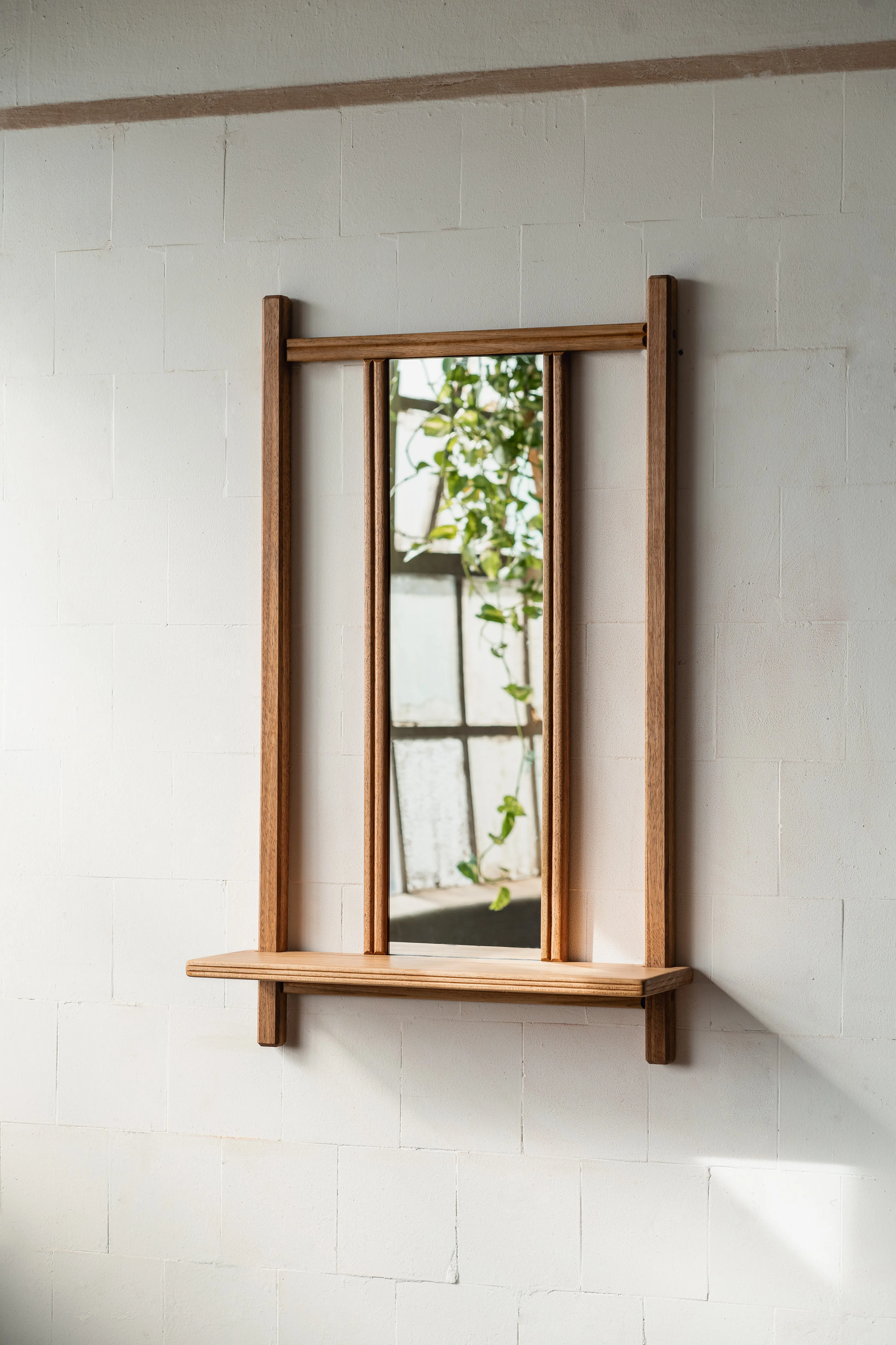 Babadeira wall mirror and shelf by atelier PASSARELLI, carved solid wood with integrated shelf