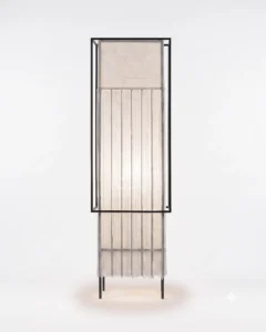 Biiit 001 table lamp with a pleated Korean Hanji mulberry paper shade and matte brass frame by mano design studio