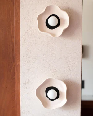 Flower Wall Lamp in stoneware, front view.