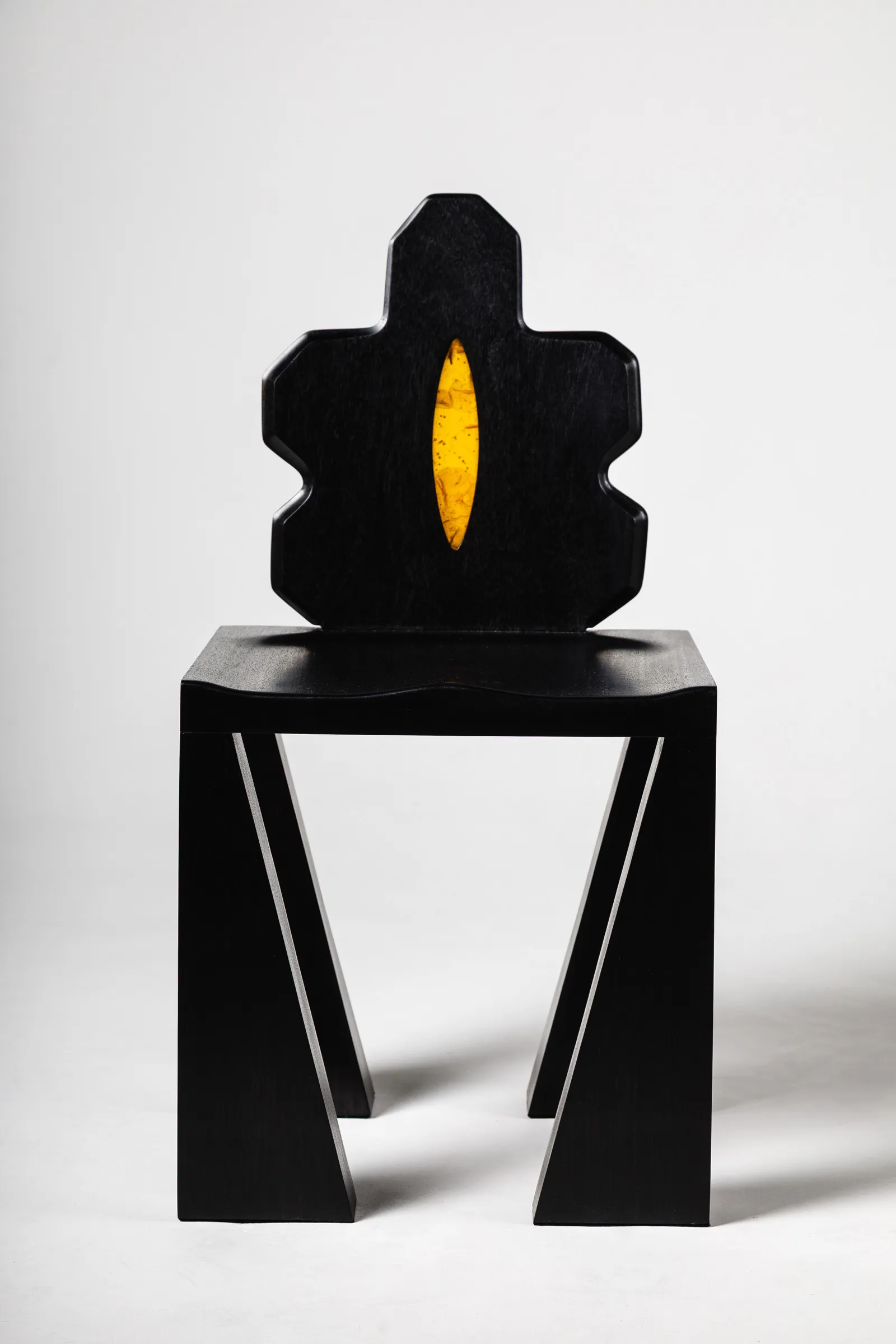 Nucleo Massiva chair in ebony wood and resin