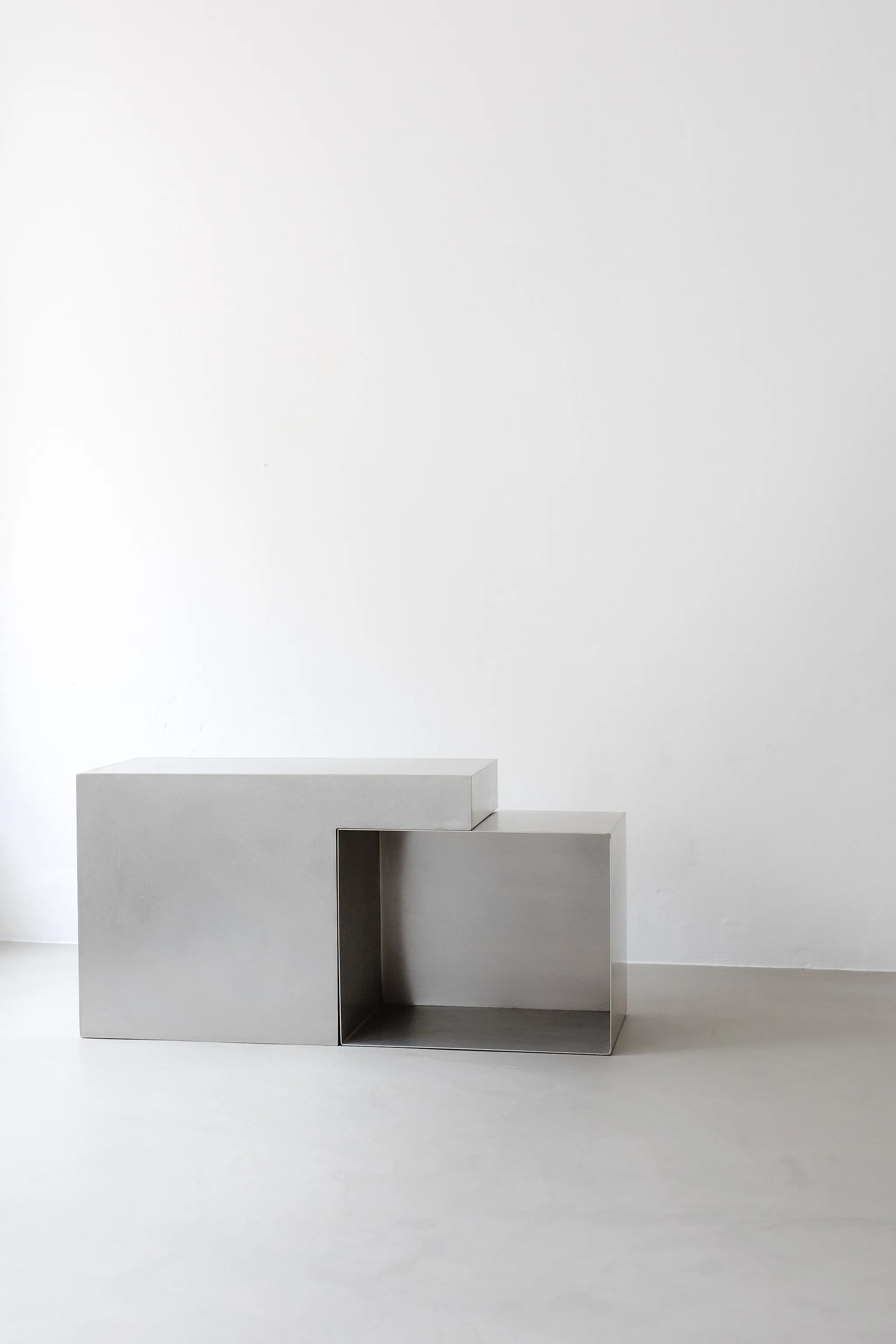 Sonar System modular brushed metal side table made of two interlocking boxes by form & eisen