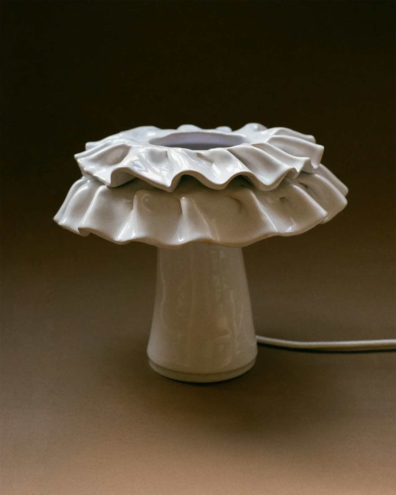 Lulu hand-built glazed stoneware table lamp with a ruffled form by Mina Wright