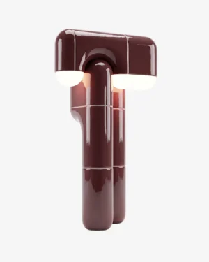 U-016 Table Lamp in Oxblood high-gloss PLA on a table, front view.