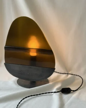 Veilleur Lp1 Table Lamp in reclaimed glass and steel, front view.