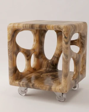 Diablito Cart Side Table by Studio Ayres, brown and honey banded onyx cube with oval openings on clear wheels, plain background