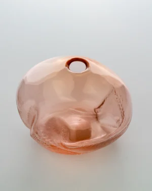 1 2 Ltr Forms Aurora Yellowish Handmade Glass Object by Vogel Studio, pink glass vase on a plain background