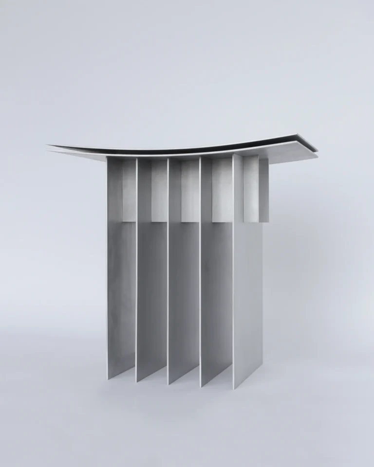 Brush Stool by SESTRA seen from the side, the curved seat resting on five parallel aluminum fins
