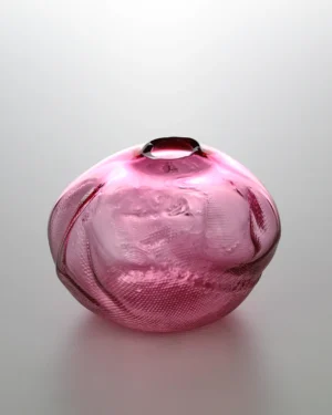 1 2 Ltr Forms by Vogel Studio, pink blown glass vase with dimpled surface, on a plain background