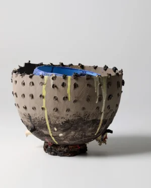 New_love_08 Ceramic Vase by C E R A M I C 4 7, stoneware bowl with dotted grey surface and cobalt blue interior, on a plain background
