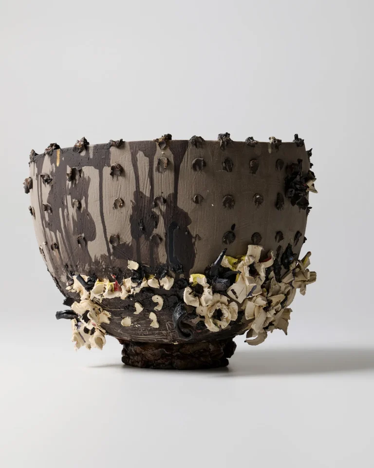New_love_08 Ceramic Vase by C E R A M I C 4 7 seen from the other side, with dark glaze drips and cream ceramic flowers around the base