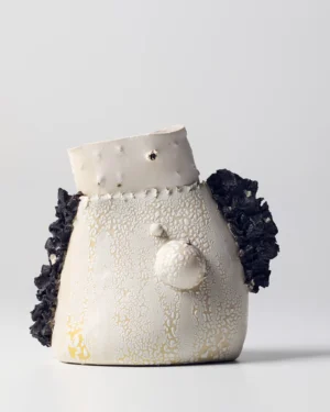 New_love_01 Ceramic Vase by C E R A M I C 4 7, white crackle-glazed stoneware vase with black ruffles, on a plain background